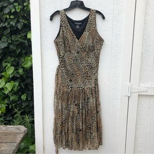 Unusual feather-like printed party dress with gold thread and feathery capelet.